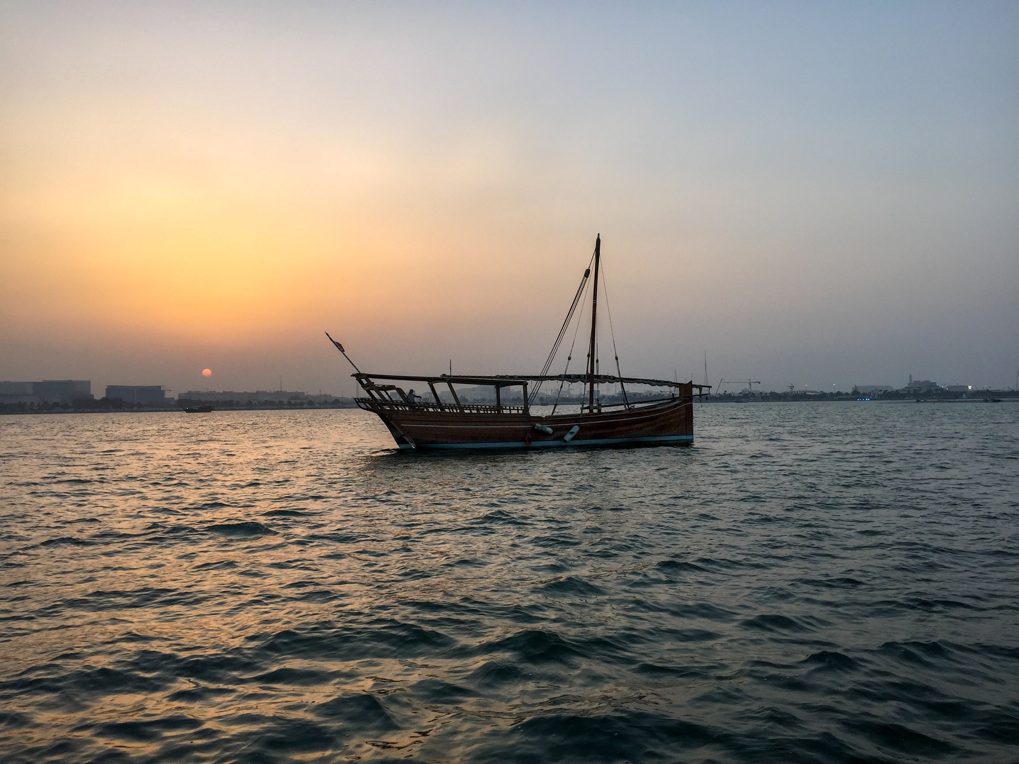 Traditional Dhow at sea of Qatar. Sea. Ocean. Travel. Traveling. Golden hour
